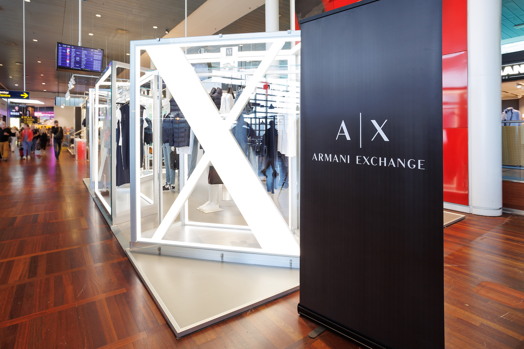 Gebr. Heinemann in travel retail first with opening of A|X Armani Exchange  pop-up : The Moodie Davitt Report -The Moodie Davitt Report