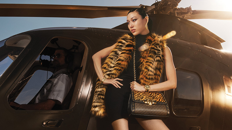 Michael Kors celebrates World Handbag Day with Moodie Davitt homepage  makeover : The Moodie Davitt Report -The Moodie Davitt Report