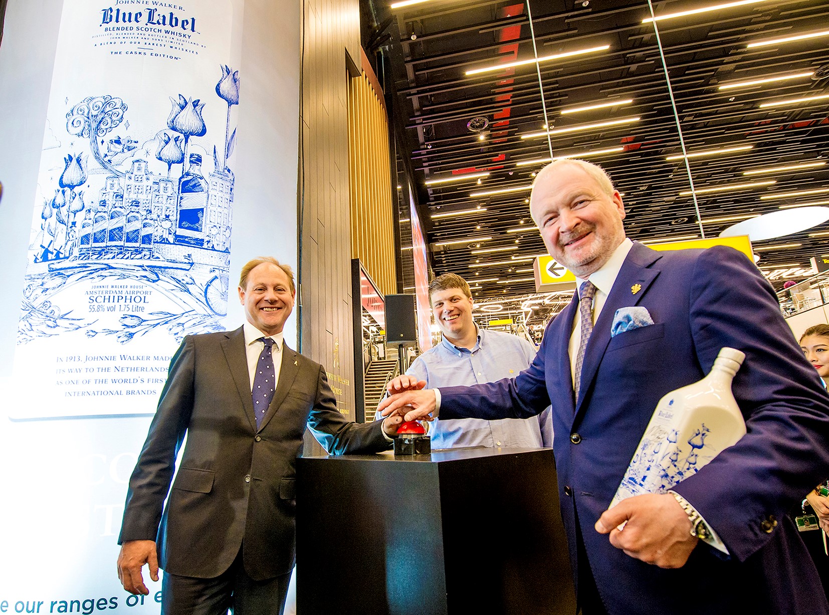 Pushing the right buttons: Diageo Global Travel Managing Director Doug Bagley, Dutch artist Merjin Hos and Gebr Heinemann Director Purchasing and Logistics Kay Spanger officially open the Johnnie Walker House at Schiphol on Friday