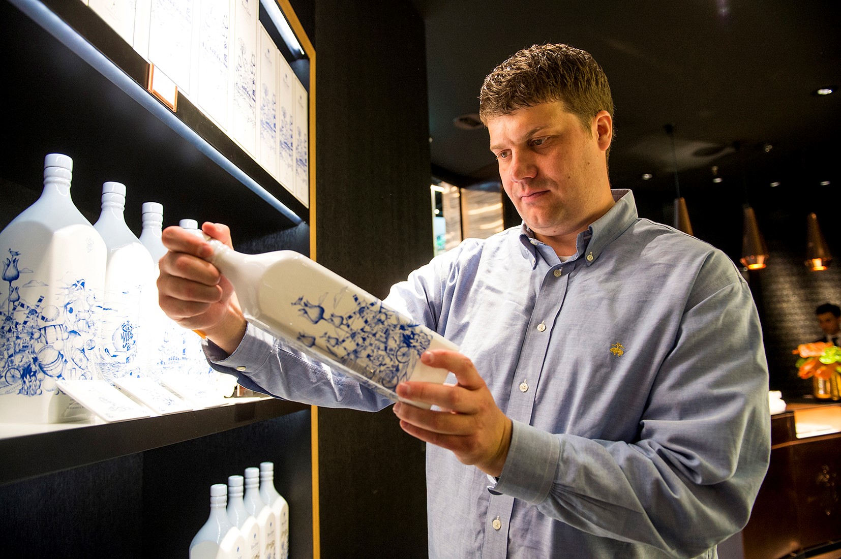 Signature design: Merjin Hos, the Dutch artist behind the design of the Johnnie Walker House Blue Label Casks Edition- Schiphol Limited Edition, at the official opening of the Johnnie Walker House Amsterdam Airport Schiphol (Photo: Marco Hofste)