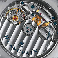 The sapphire crystal case-back that reveals the CÃ´tes de Genève decorative motifs, bevelled bridges, screws and oscillating weight engraved with the name 'Blancpain'
