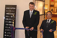 Ed Brennan (left, with the Vice-Governor of Okinawa at the Louis Vuitton opening):