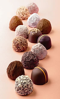 Godiva's reinvented Truffle Collection includes six original centres: apricot, cashew, coconut, pear, raspberry and strawberry 