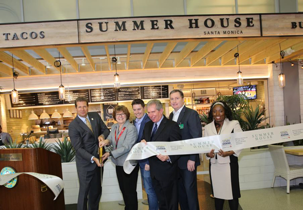 At the ribbon cutting ceremony, from left to right: HMSHost President & CEO Steve Johnson; Chicago Department of Aviation Commissioner Ginger S.Evans; Summer House Divisional Director Corey Milner; Alderman of the 23rd Ward of Chicago Aviation Chairman Michael Zalewski; Lettuce Entertain You Enterprises Partner Kevin Reynolds and Chicago Department of Aviation Managing Deputy Commissioner Revenue Tiffany L. Green. Photo Credit: Sheri Whitko Photography