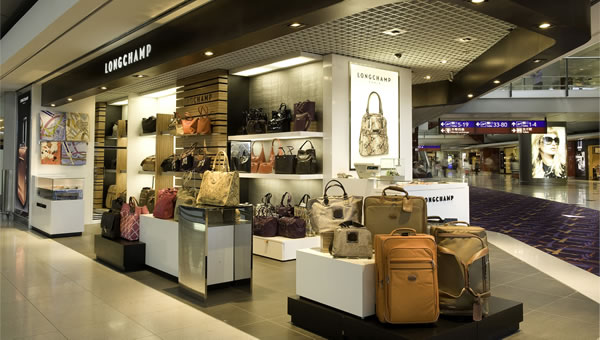 Longchamp heathrow price sales