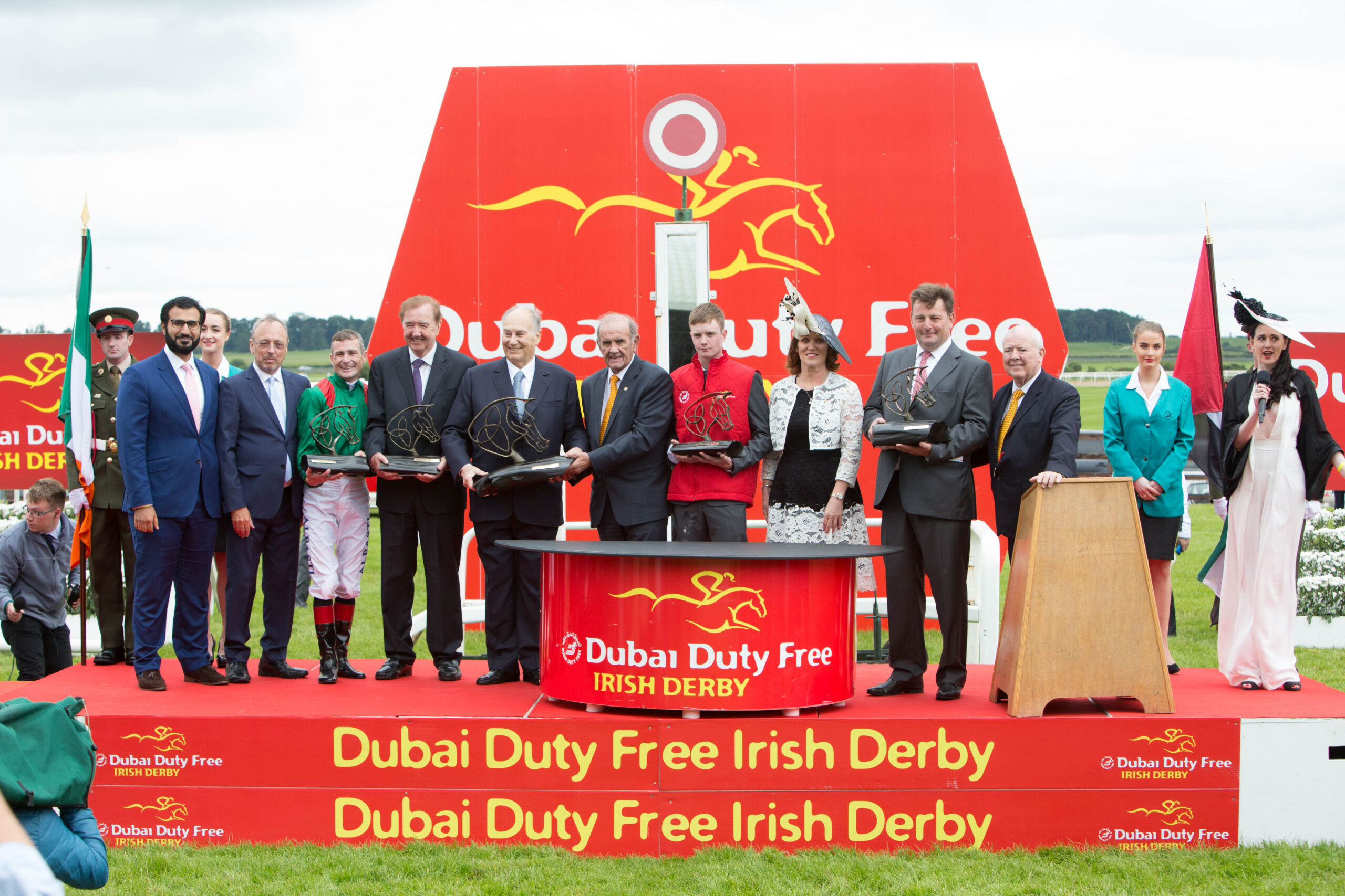 Grand prize: Dubai Duty Free senior management led by Colm McLoughlin present the winning connections with the trophy