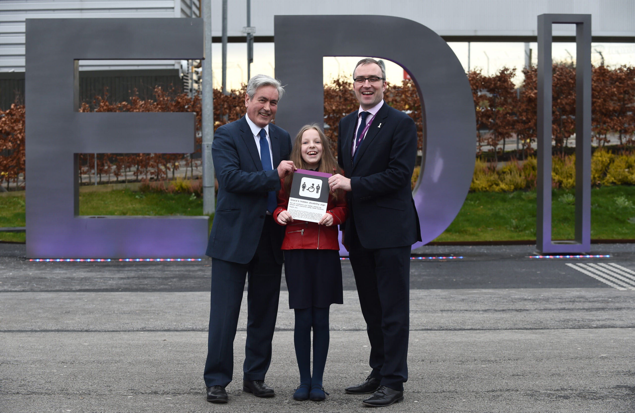Picture by Lesley Martin 27 February 2017 Gracie Warnock age 11 from Prestonpans who suffer from Crohn's designed a sign for silent disabilities which have been implemented in various establishments including Edinburgh Airport. Gracie is joined by Gordon Robertson (Director of Communications at Edinburgh Airport) and Iain Gray (Scottish Labour Party). ****** free first use only/ not for archive ****** © Lesley Martin 2017 - All Rights Reserved t: 07836745264 e: lesley@lesleymartin.co.uk