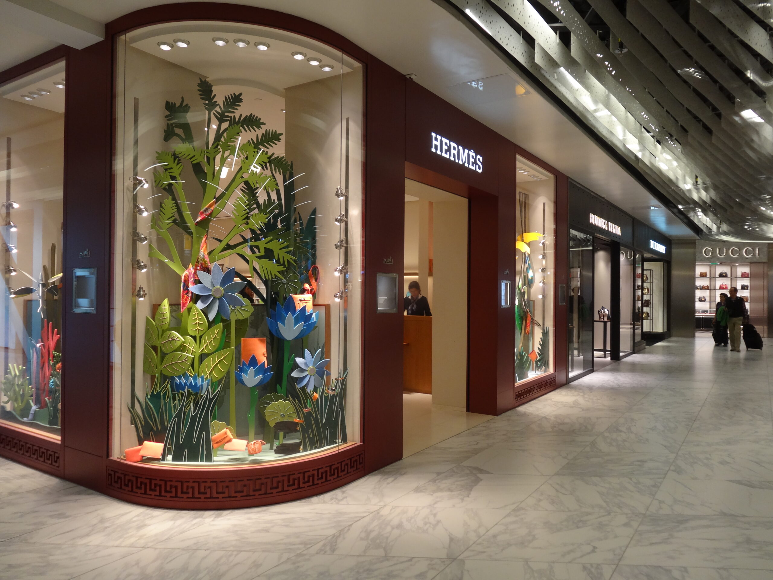 Hermès adapted its store front wonderfully for the environment; through Lagardère Travel Retail the brand features in the Luxury 'world' alongside Burberry, Gucci and Bottega Veneta 