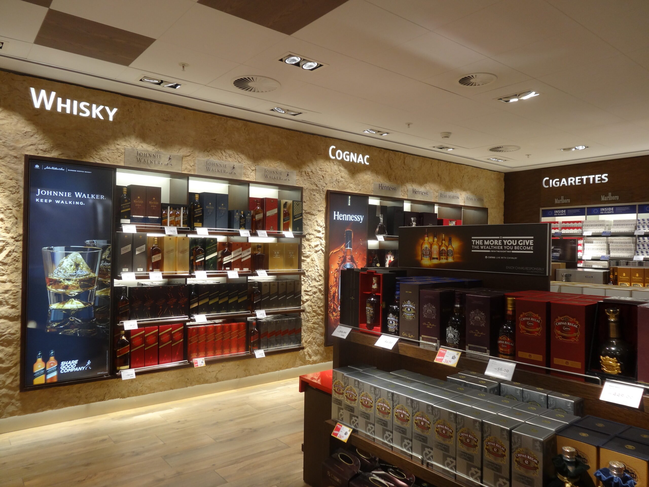 The Schiphol Airport Retail main store carries many signature design touches from Gebr Heinemann, majority owner since last year