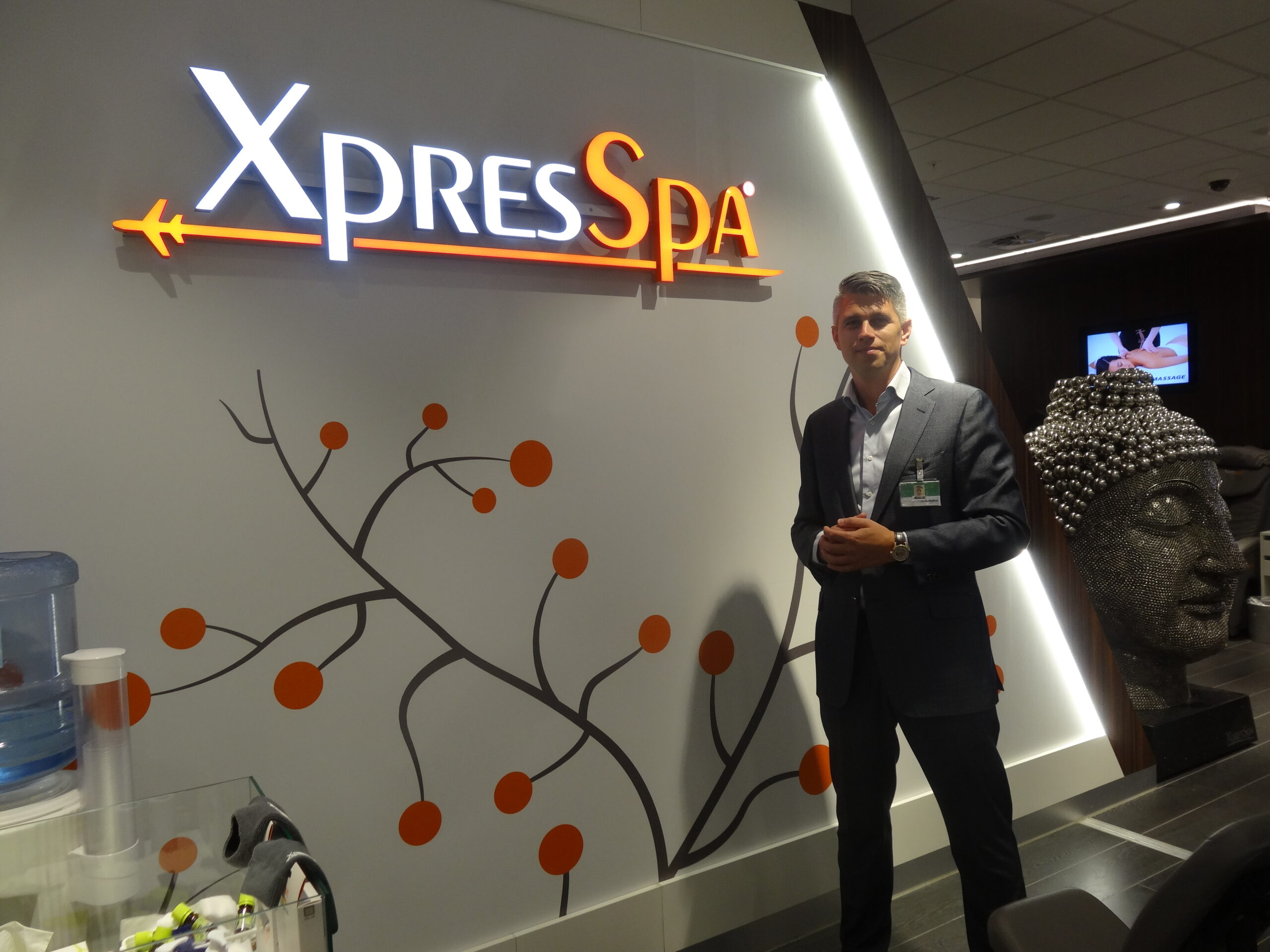 XpresSpa Europe & Middle East Managing Director Patrick Jansen at the company's new outlet, featuring an eye-catching Buddha figure plus new services such as haircare