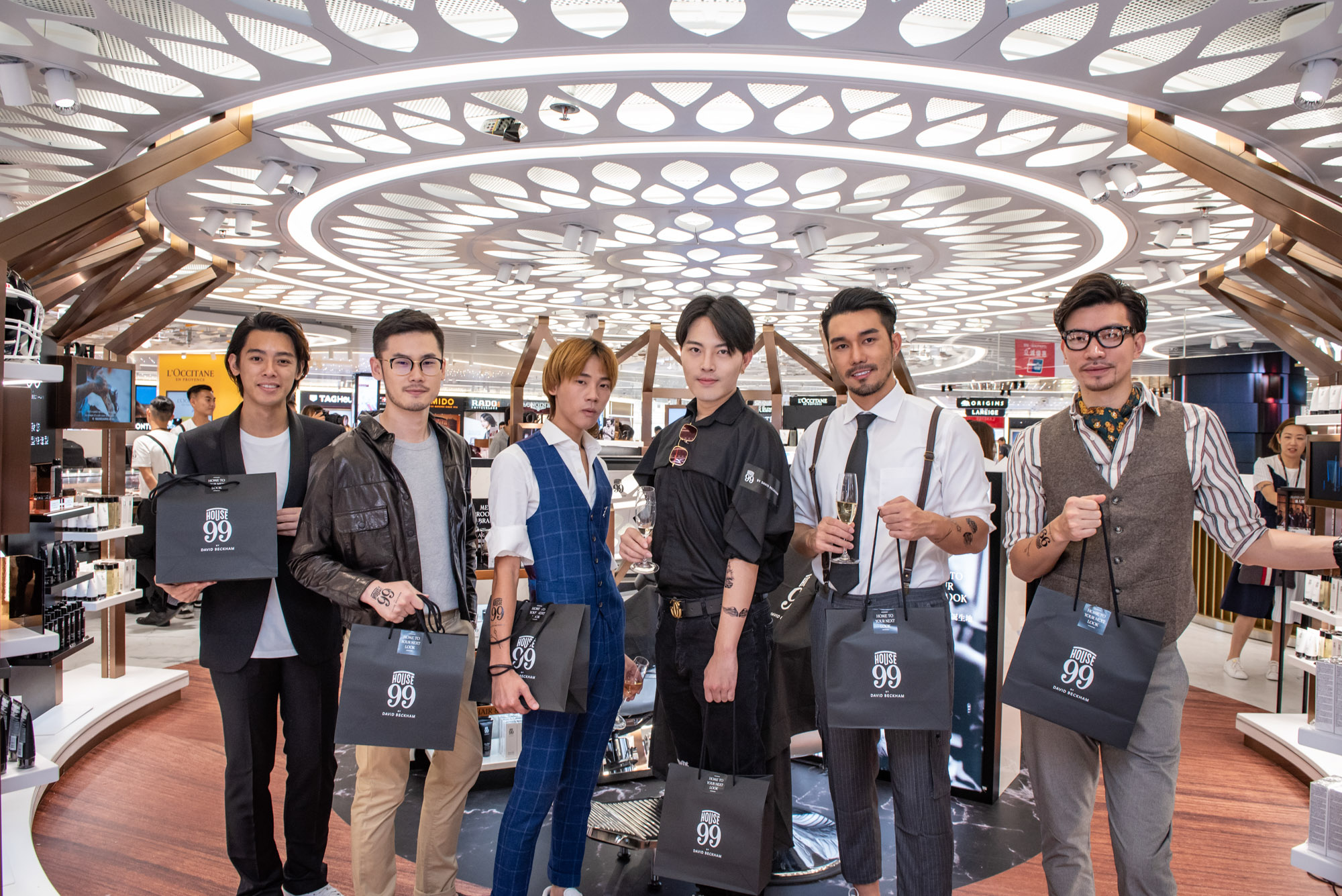 Influencers at launch of The Shilla Duty Free House 99 by David Beckham pop-up at Hong Kong International Airport