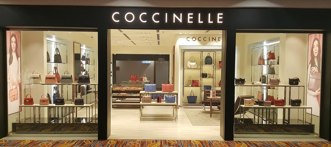 Coccinelle has been busy developing its global business with openings including this 100 sq m standalone boutique in Yangon International Airport Terminal 2