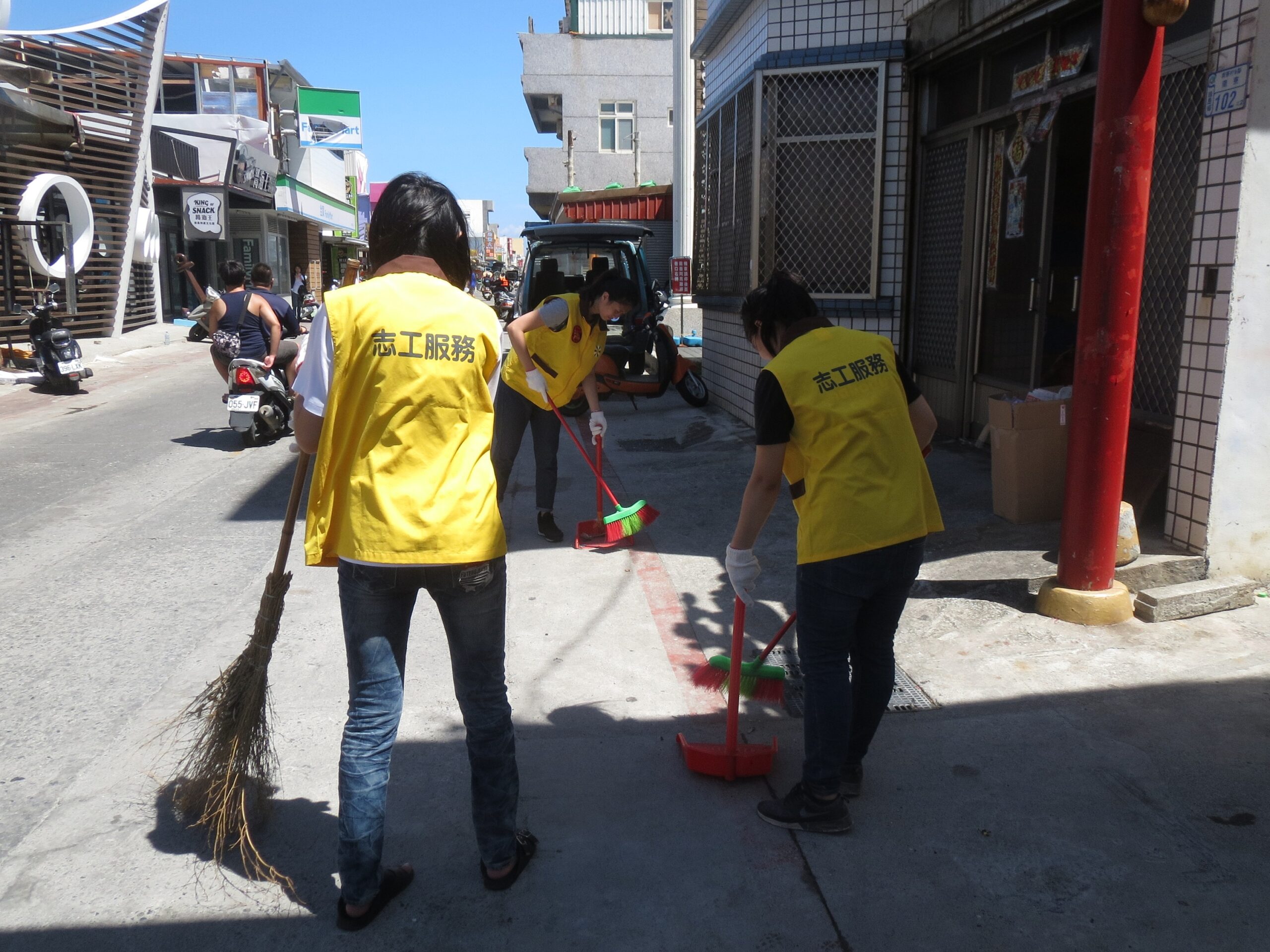 Profond duty free staff help to clean up the mess for local