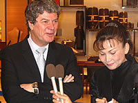 Yves Carcelle, President LVMH Fashion Group, fields reporters' questions at the official opening